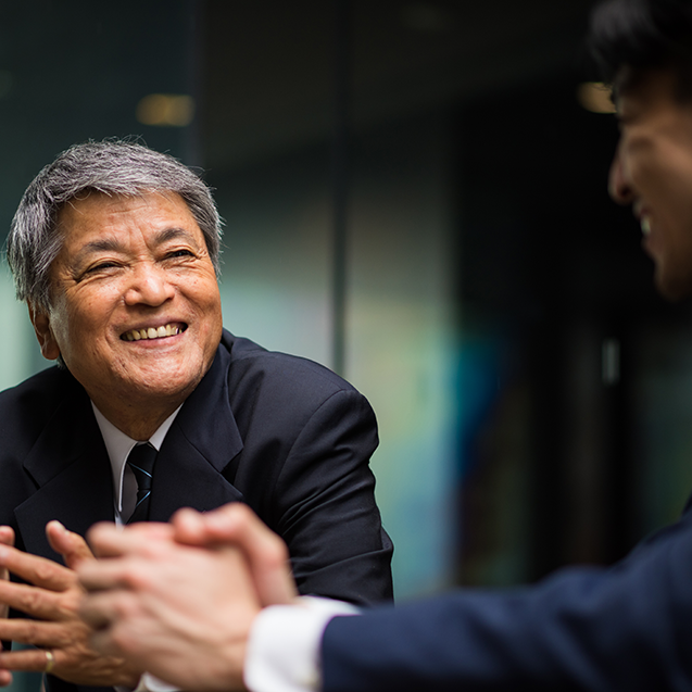 A man in a formal meeting, discussion something.